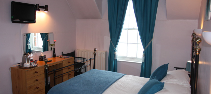 The Beach Hotel Bedroom